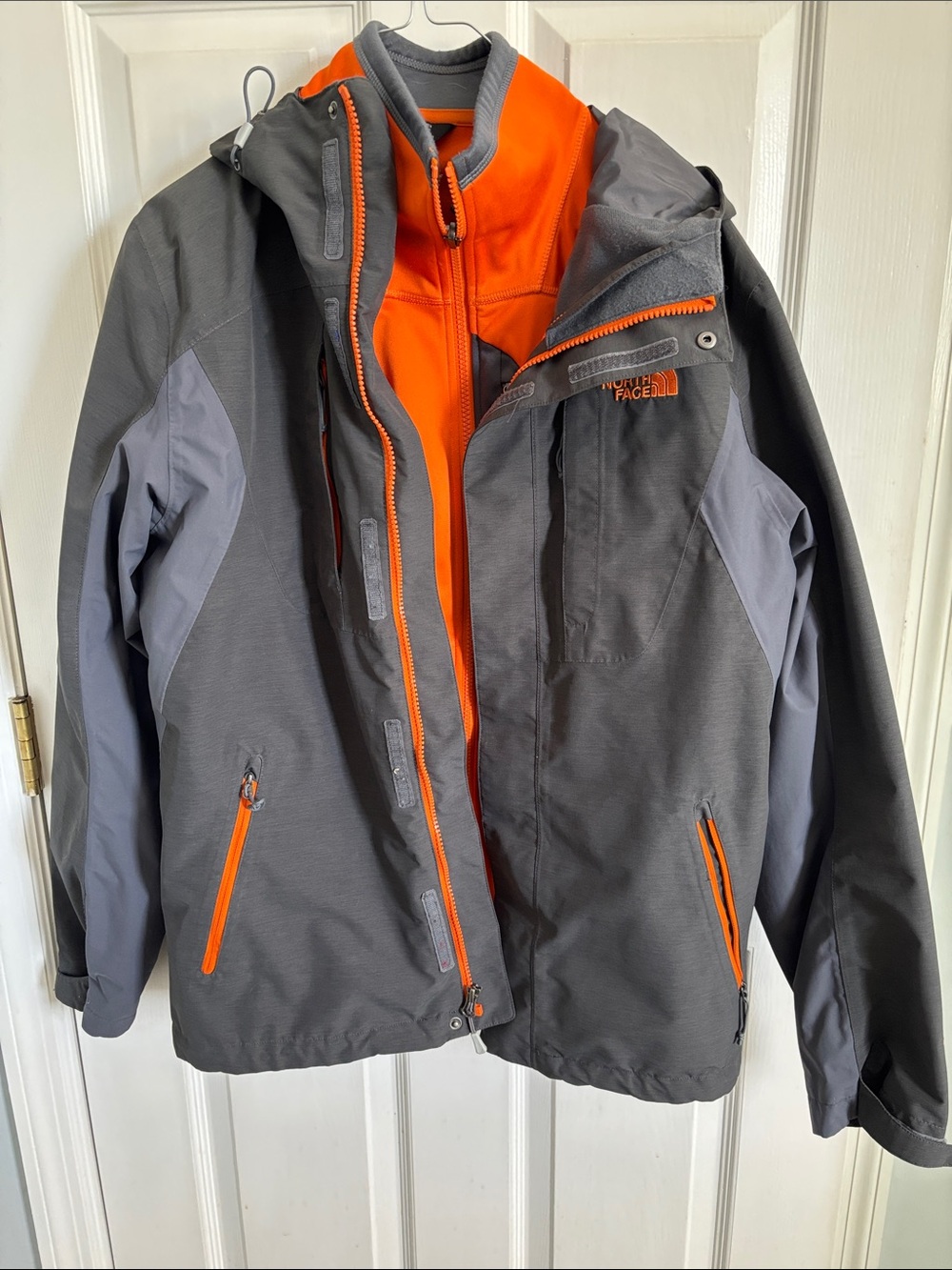 The North Face Men’s Gray Jacket with Orange Accents